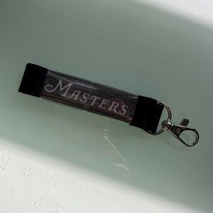 The Masters repeated logos black long lanyard with clasp